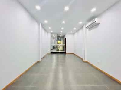 Cho thuê nhà mới, mặt tiền Võ Văn Tần, Quận 3, DT: 4 x 28m, trệt 4 lầu thang máy, Spa,Shop,VP.....