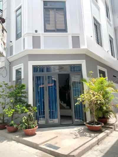 Nhà góc, mới 4 tầng hẻm thông đường Nguyễn Tiểu La, P.8, Q.10