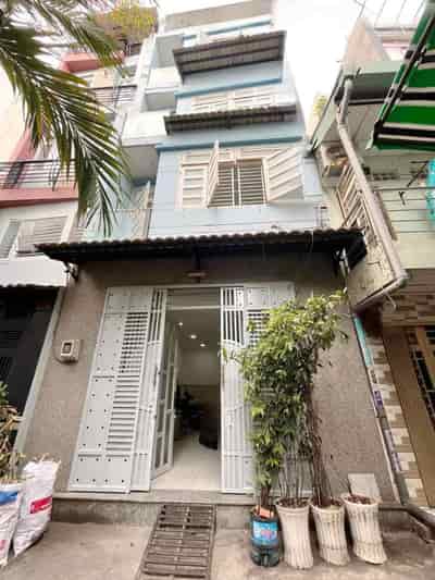 Nhà mới 5 tầng có 12 phòng cho thuê 2 mặt hẻm HXH đường Nguyễn Tiểu La P5, Q10
