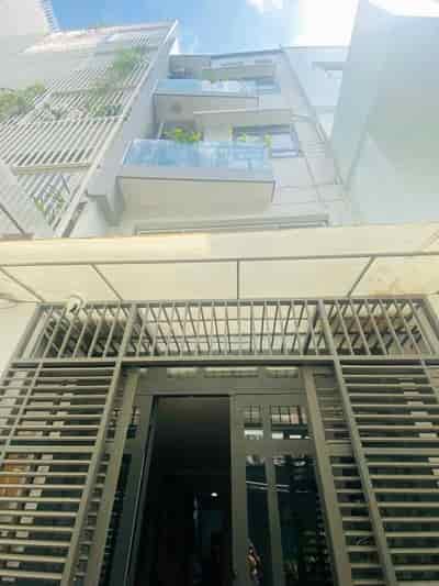 Nhà mới 4 tầng HXH sát đường Nguyễn Kim P6, Q10, 7.3 tỷ