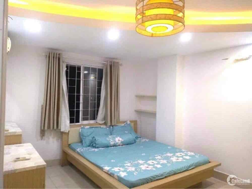 Phá sản bán gấp nhà 1 trệt 1 lầu đường Nơ Trang Long gần bv Ung Bứu, diện tích 68m2 giá 1 tỷ 020, shr