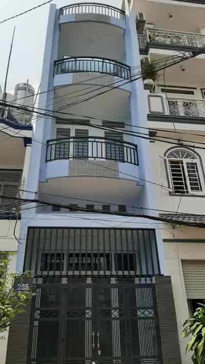 Cho thuê nhà mới 4 tầng mặt tiền Bùi Điền, p5, Q8, 6PN