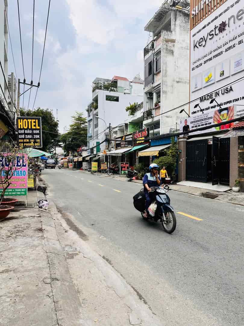 Bán tòa nhà mặt tiền Nguyễn Súy, gần chợ Tân Hương, 4x25m, cấp 4, tiện xây, 11.9 tỷ