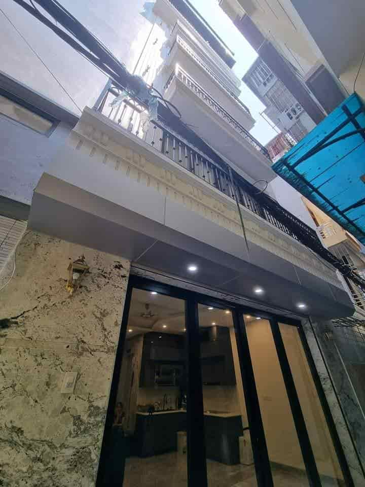 Bán nhà mới đẹp 7 tầng thang máy khu vực phố Xã Đàn Hồ Ba Mẫu ô tô đậu gần nhà, dt 45m2, mt 5m gồm 4 phòng ngủ