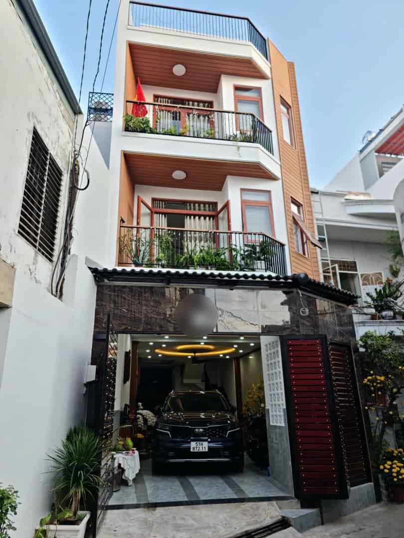 Bán nhà Phan Văn Trị hẻm xe hơi sát mặt tiền xe hơi ngủ trong nhà 4 tầng 90m2