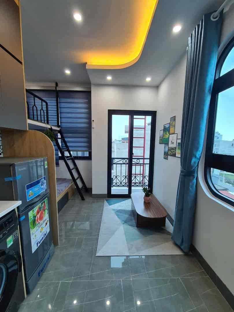 Bán căn hộ dịch vụ Vân Canh, 70m, 6.5 tầng, 2 thoáng, thang máy, có gác lửng full đồ, ô tô đỗ cửa dòng tiền 60tr