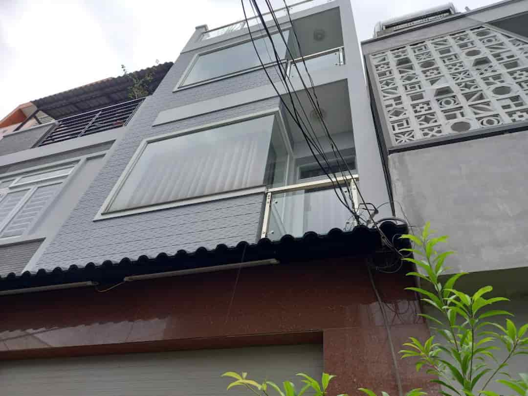 Bán nhà Bùi Quang Là, P.12, quận Gò Vấp, 4 tầng, đường 5m, giá giảm còn 5.x tỷ