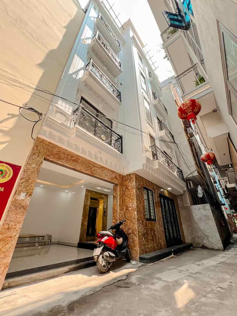 Nhà hiếm phố vip Hoàng Đạo Thành, 45m2, 6T thang máy, nhà mới tinh, ô tô đỗ cửa