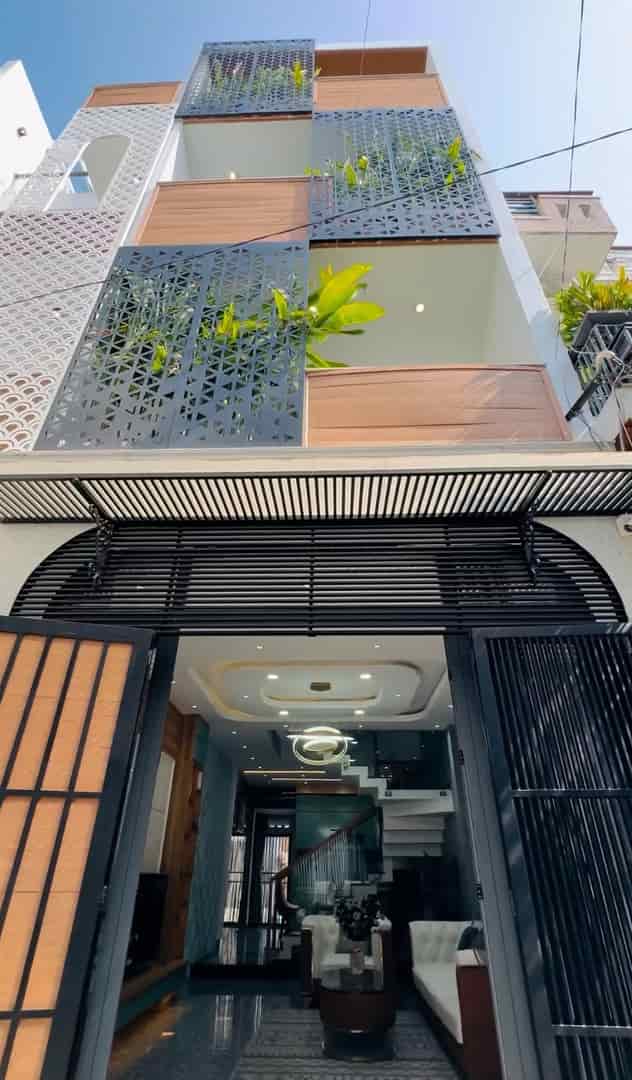 Chính chủ bán nhà 67m2 xây 1 trệt 2 lầu Nơ Trang Long, Bình Thạnh, giá 2tỷ750, có sổ hồng riêng.