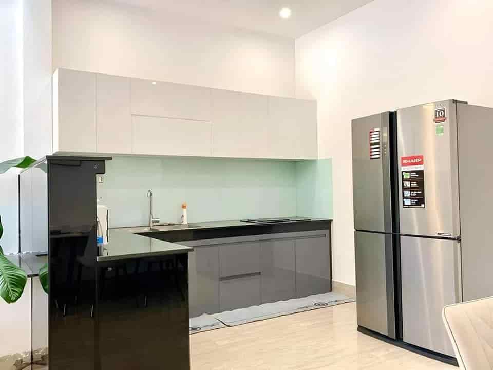 Bán nhà đi định cư Hoàng Sa, Q.3, 65m2, 2 tỷ 050, sổ hồng riêng