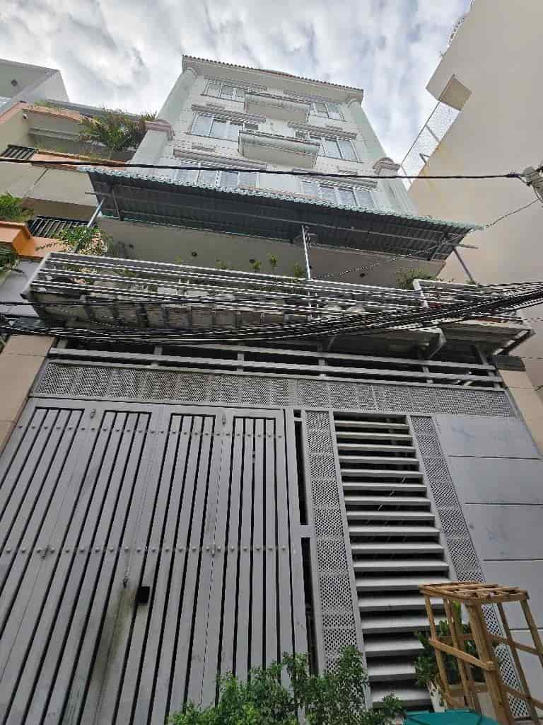 Nhà 5 tầng, 85m2, MT 7m2, 11PN CHDV, dòng tiền 600tr, Phú Thuận, quận 7
