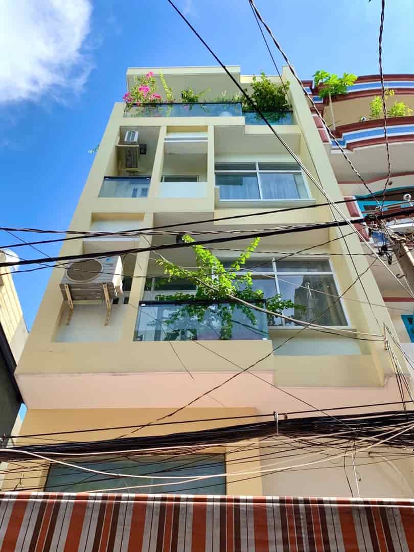 Bán nhà 54m2 Lê Thánh Tôn, P.Bến Thành, Q1, DT 54m2, trệt, lửng, 3 lầu, giá 2 tỷ 350, gần MT Trương Định