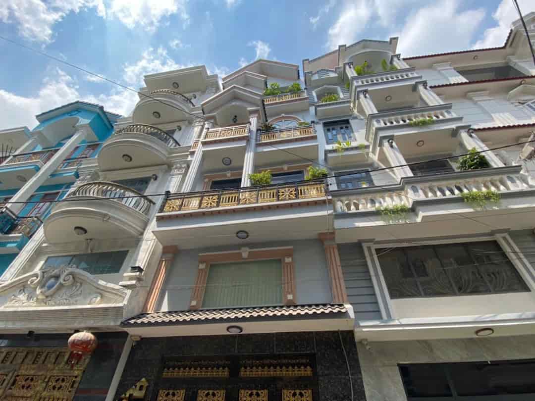 Trần Thị Hè, quận 12, 5 tẩng lầu, DT 4.8*13m, giá 6 tỷ, hẻm xe hơi quay đầu.