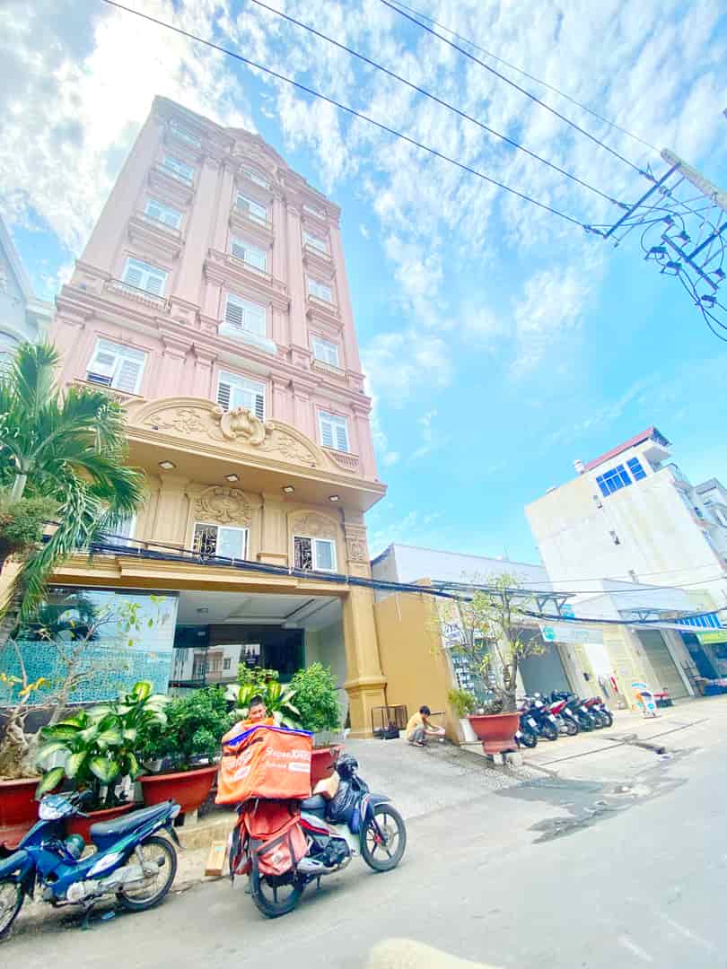 Bán tòa tháp căn hộ dịch vụ 106 phòng mặt tiền 71 đường số 53 phường Tân Quy Q7