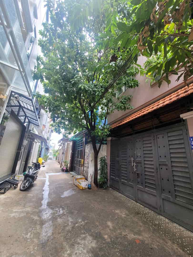 Định cư cho con bán nhà 1T, 1L đường Lê Quang Sung, Q.6, 60m2, 1tỷ2