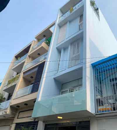 Nhà mặt tiền kd giao Nguyễn Thị Thập 4 tầng, trung tâm quận 7, giáp Phú Mỹ Hưng